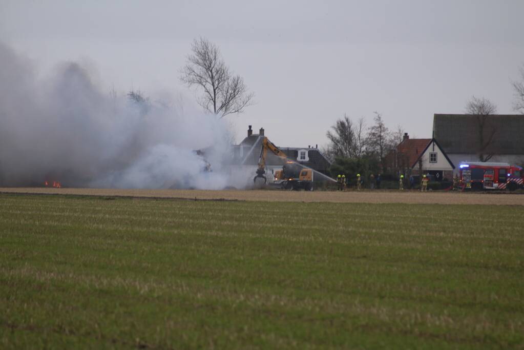 Brand in schuur met gestalde caravans