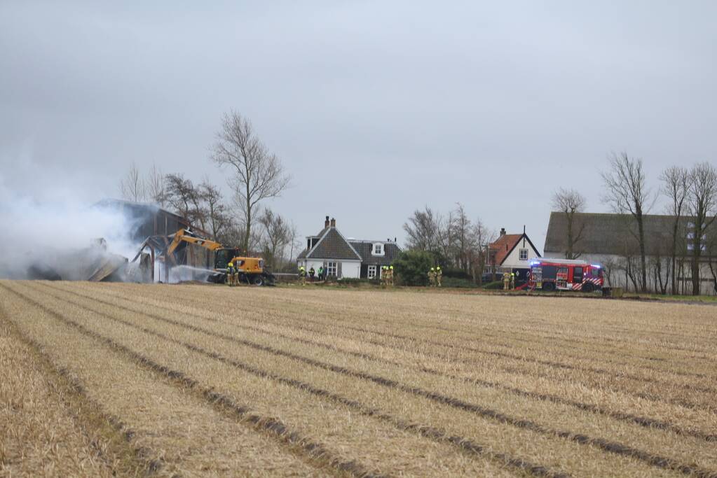 Brand in schuur met gestalde caravans