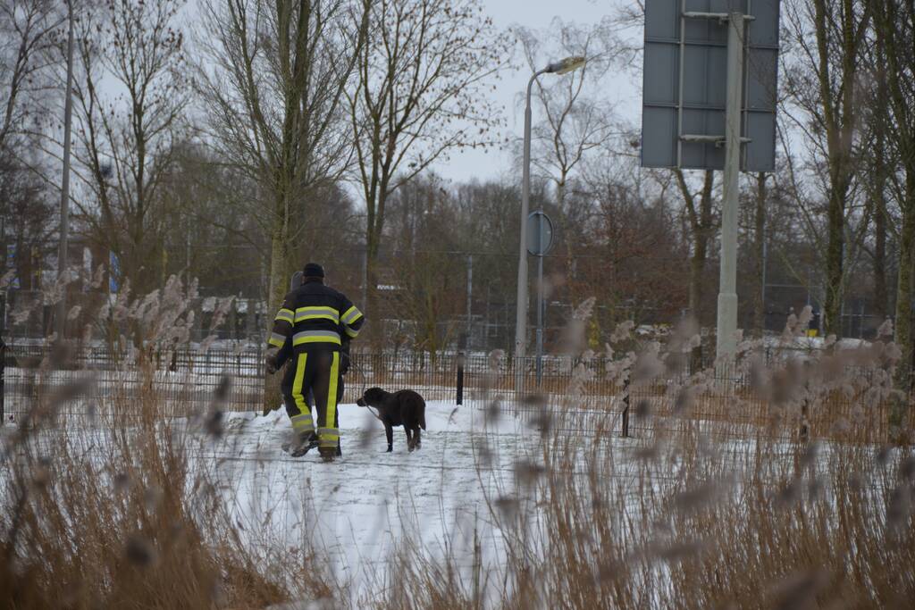 Hond door ijs gezakt