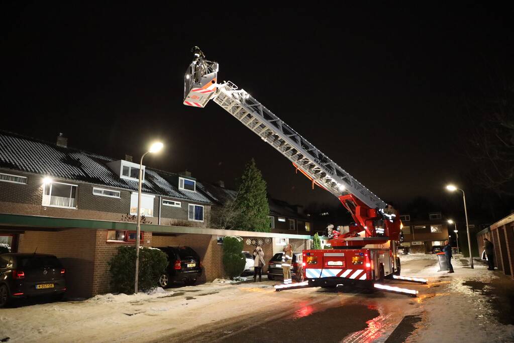 Rookwolken bij brand in schoorsteen