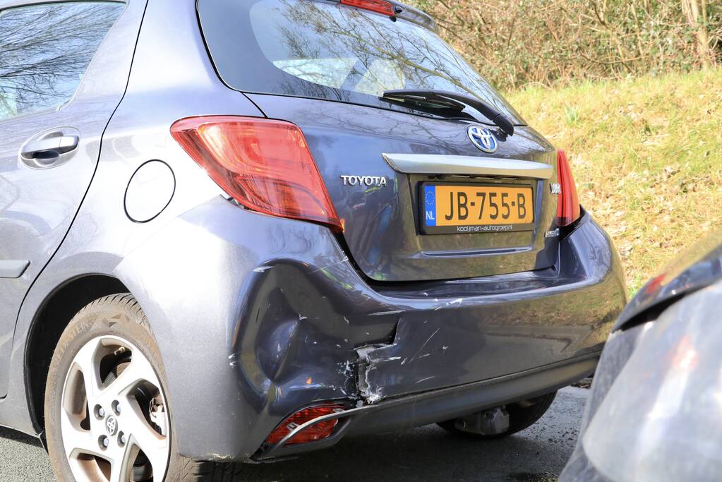 Kop-staart botsing voor stoplicht