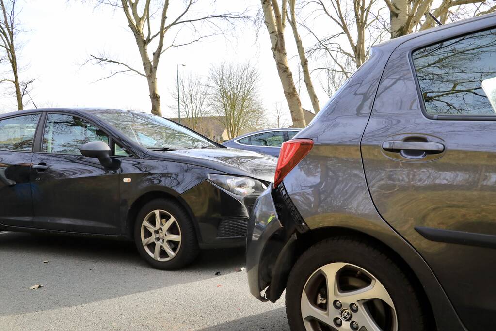 Kop-staart botsing voor stoplicht