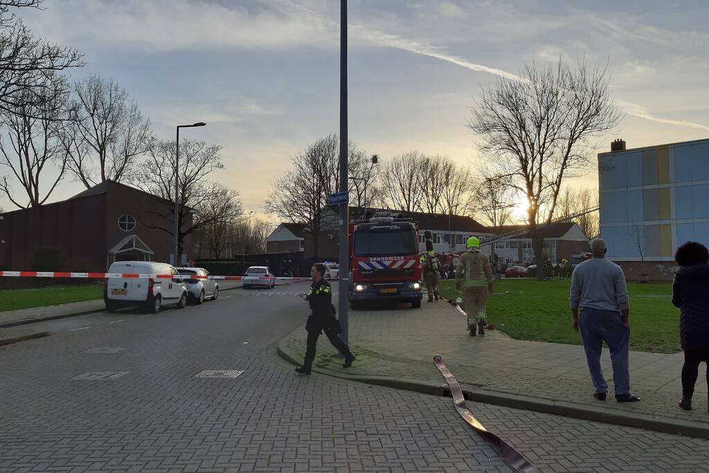 Veel schade bij brand in portiekwoning
