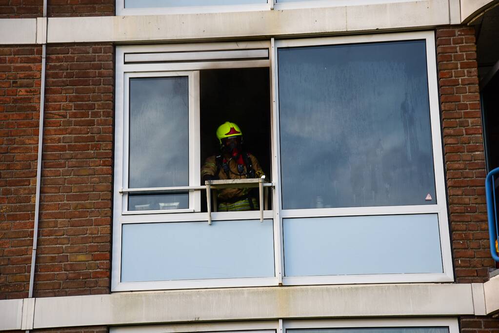 Veel schade bij brand in portiekwoning