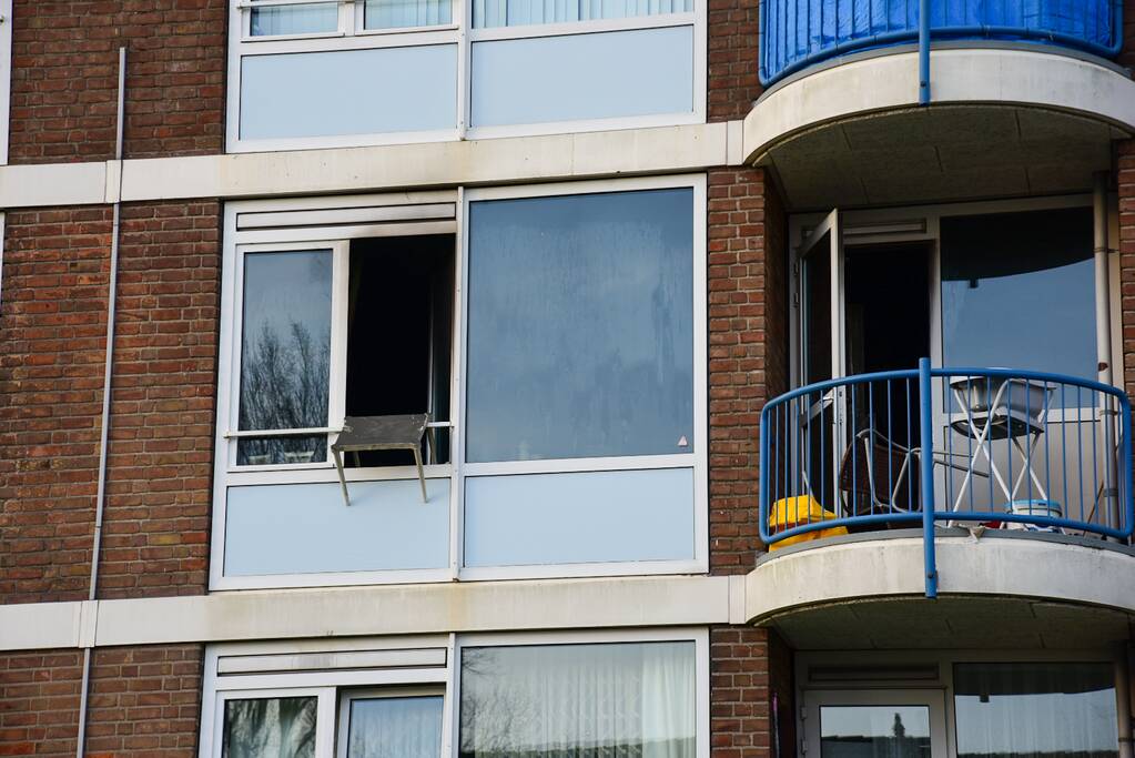 Veel schade bij brand in portiekwoning