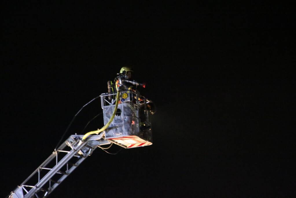 Grote uitslaande brand in fietsenzaak