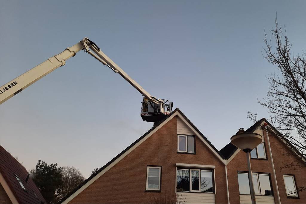 Schoorsteen geveegd na brand