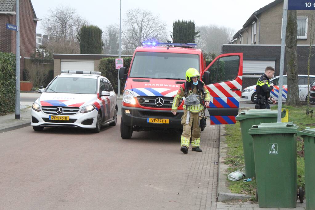 Opgerold vloerkleed vat vlam