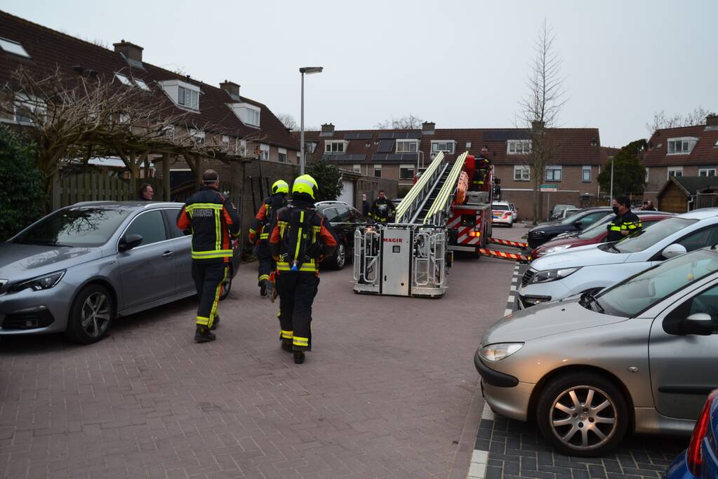 Schoorsteen woning in brand