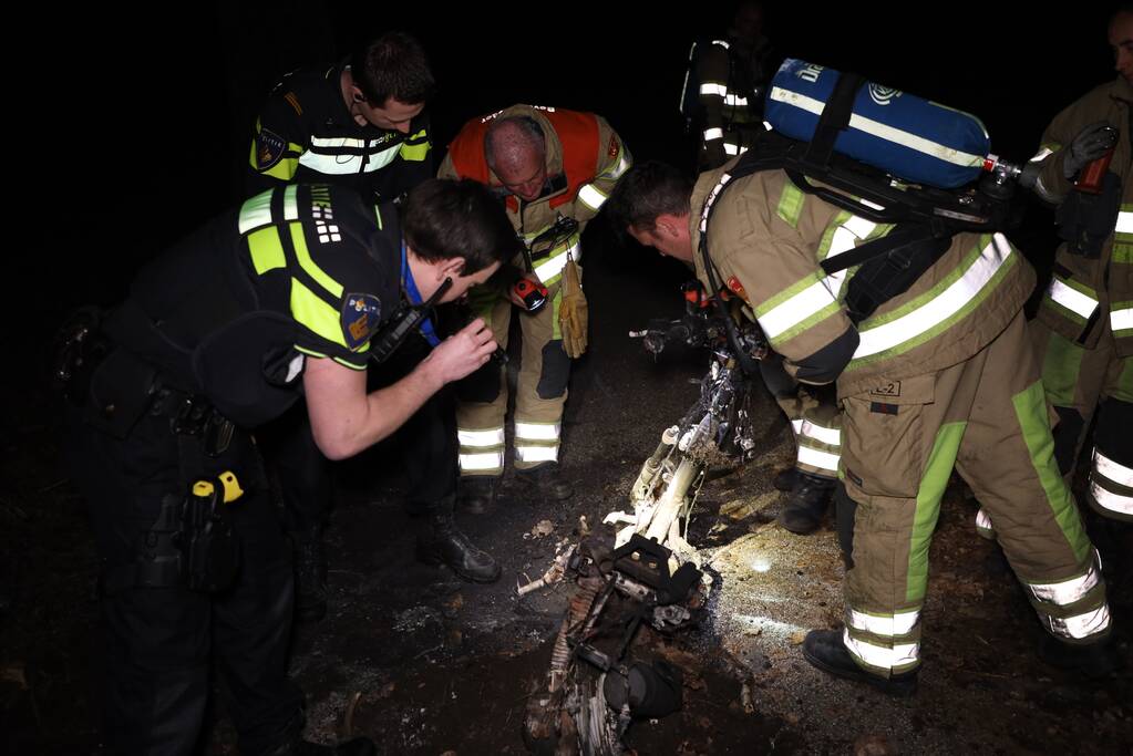 Scooter in brand gestoken