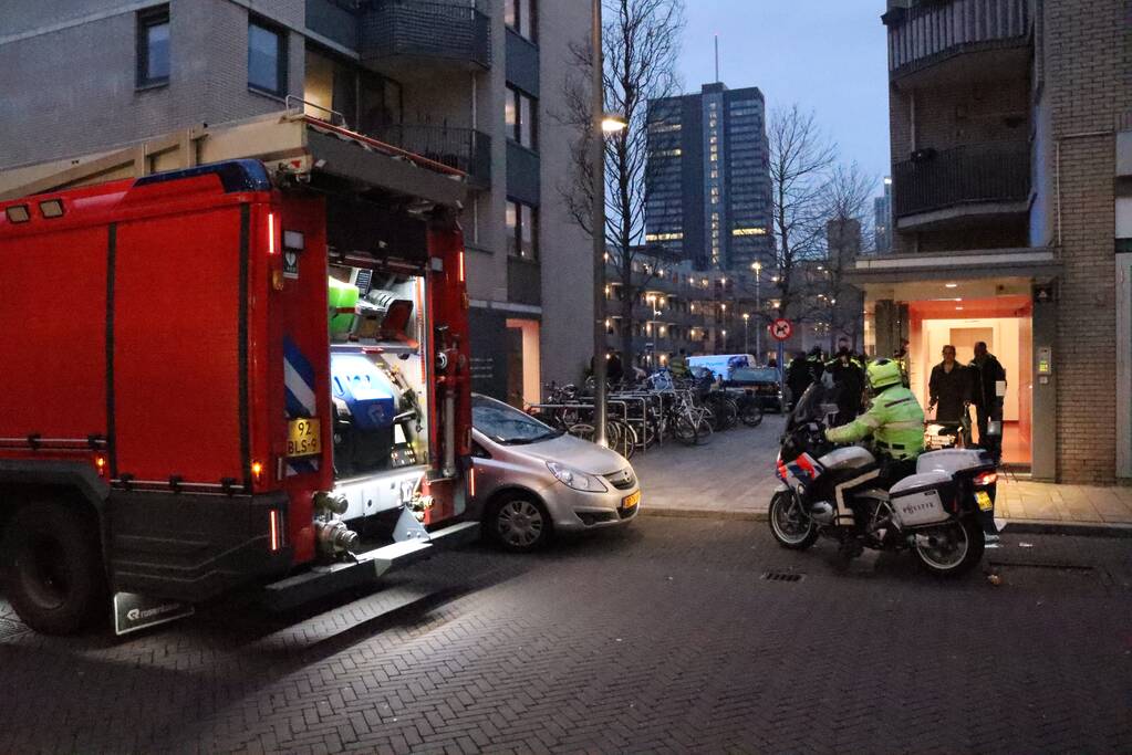 Brand in flatwoning boven winkels