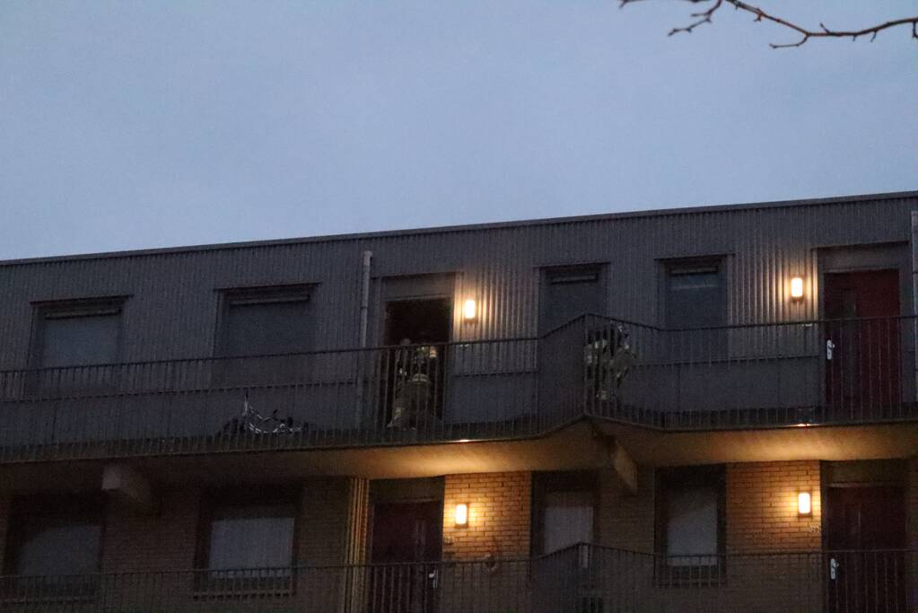 Brand in flatwoning boven winkels