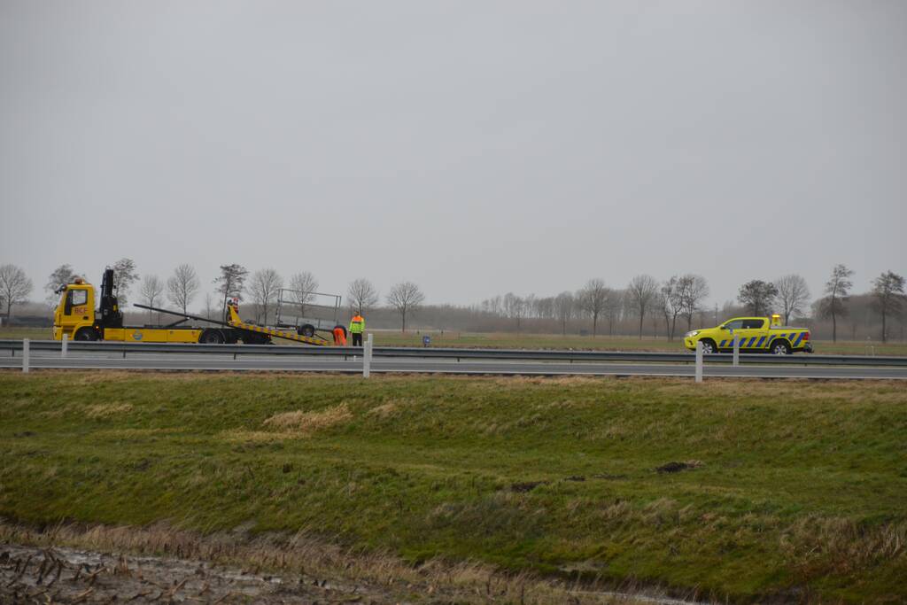 Aanhangwagen van oprit gehaald