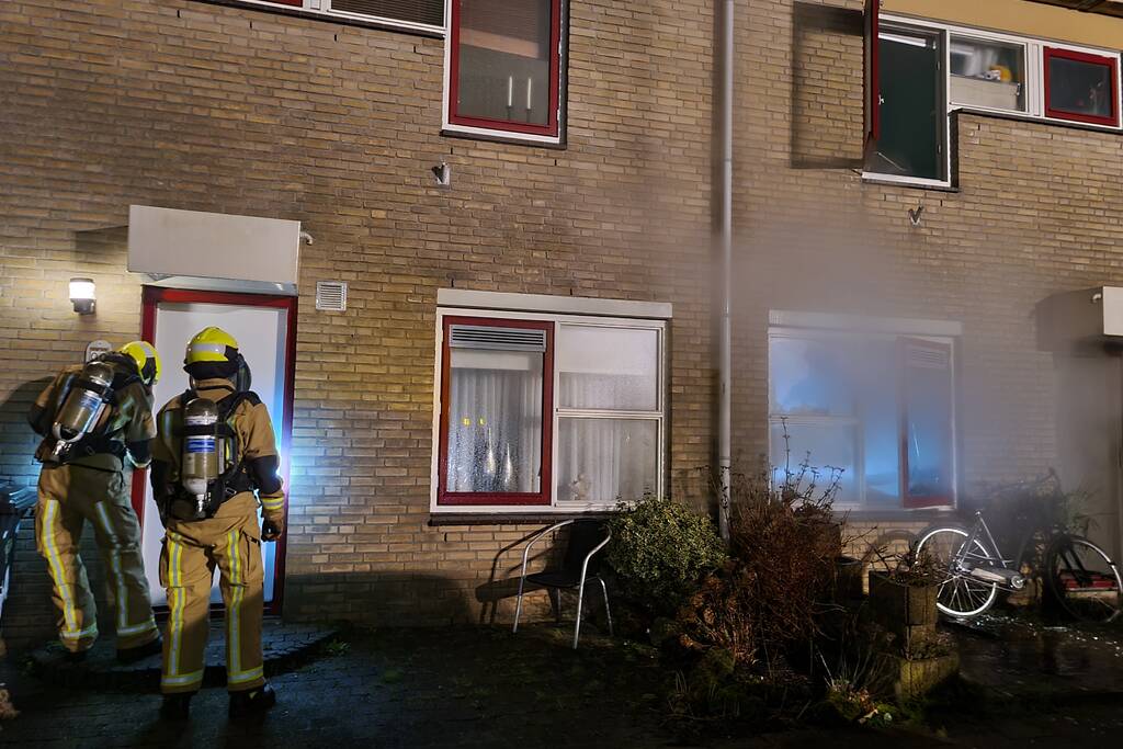 Forse rookontwikkeling bij woningbrand
