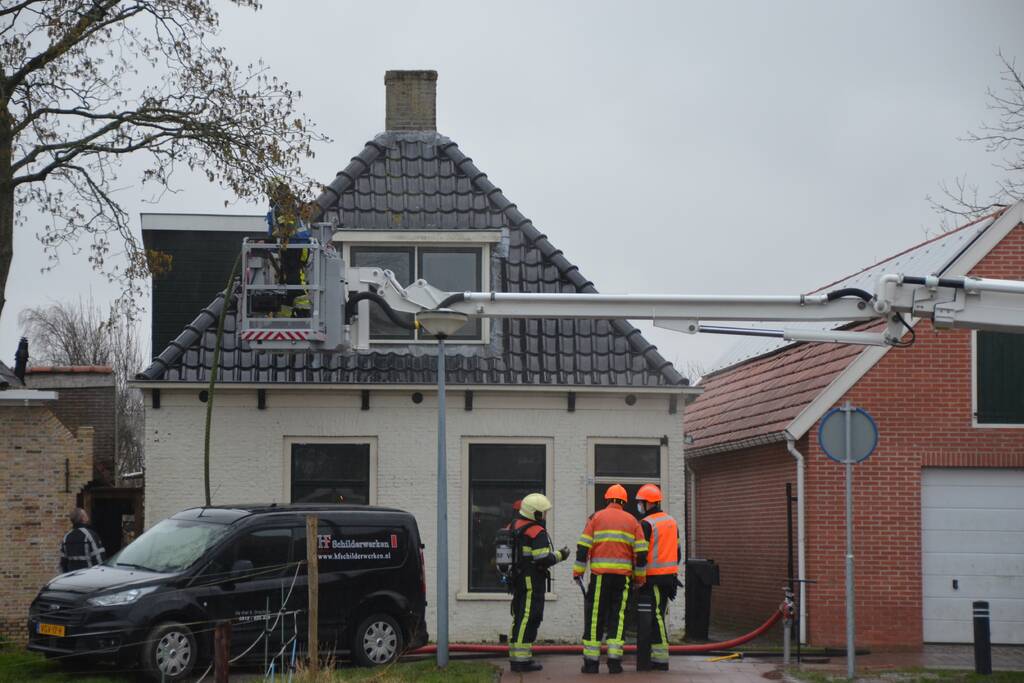 Woning vol rook bij brand