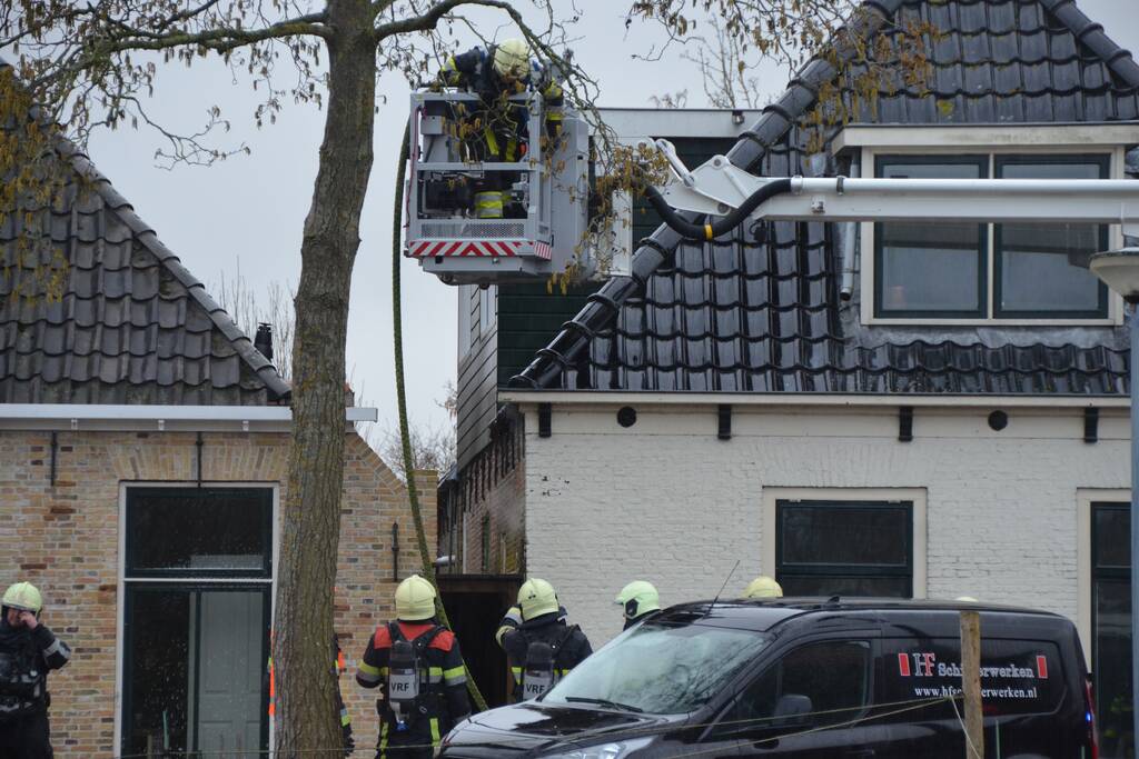 Woning vol rook bij brand