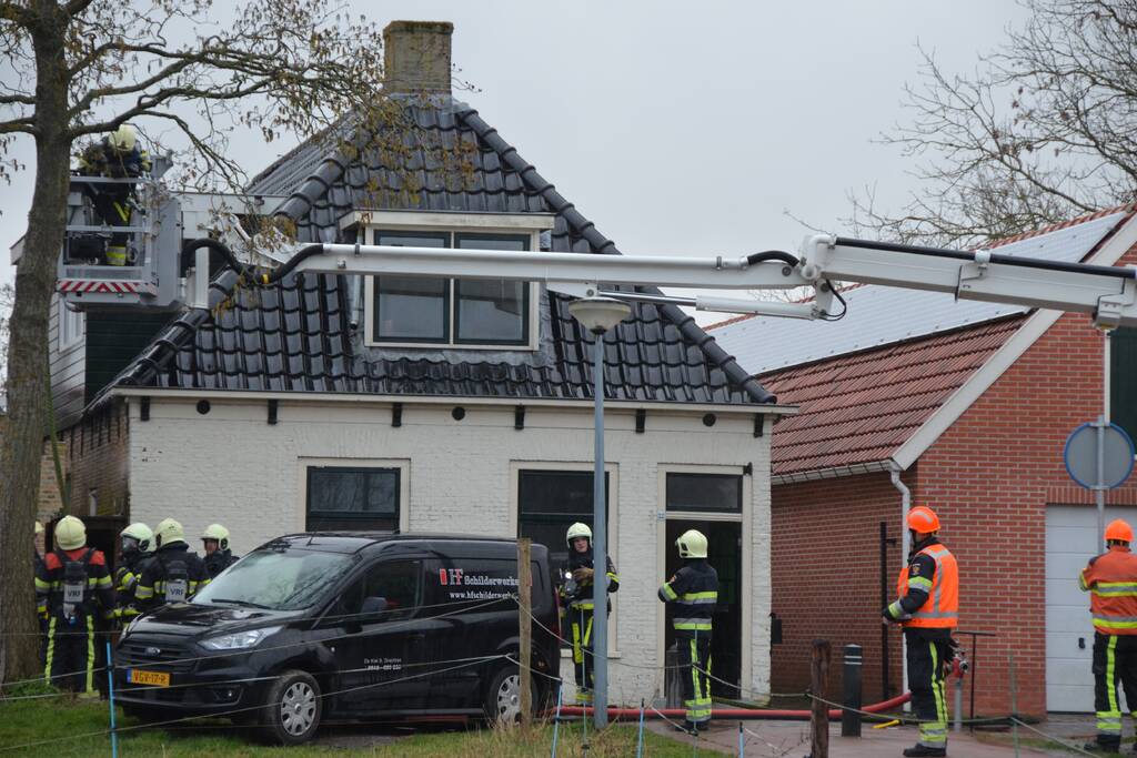 Woning vol rook bij brand