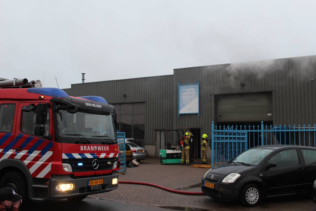 Veel rookontwikkeling na brand in machine