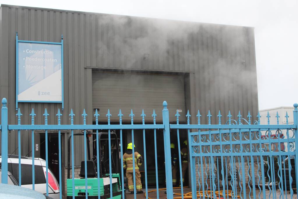 Veel rookontwikkeling na brand in machine