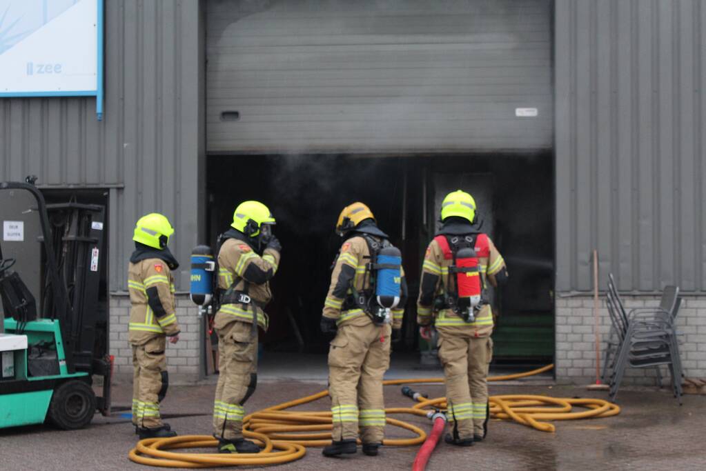 Veel rookontwikkeling na brand in machine