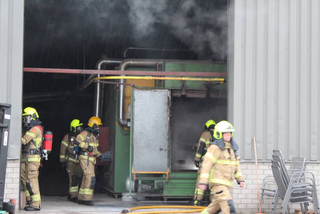 Veel rookontwikkeling na brand in machine