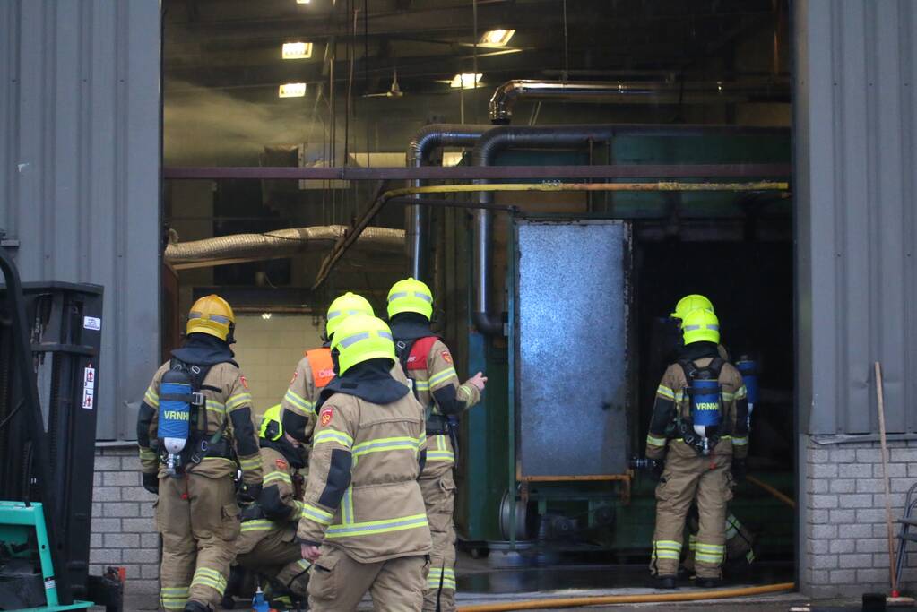 Veel rookontwikkeling na brand in machine