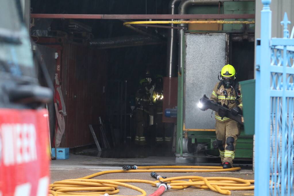 Veel rookontwikkeling na brand in machine