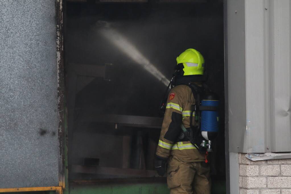 Veel rookontwikkeling na brand in machine