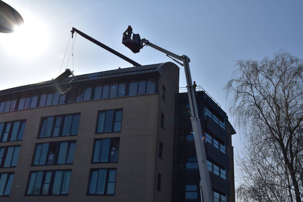 Glazenwasser vast in op hol geslagen lift