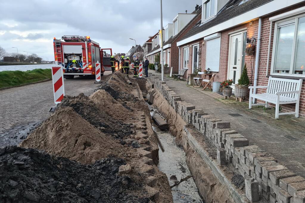 Stoeptegels gevallen op leiding