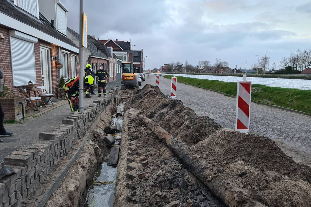 Stoeptegels gevallen op leiding