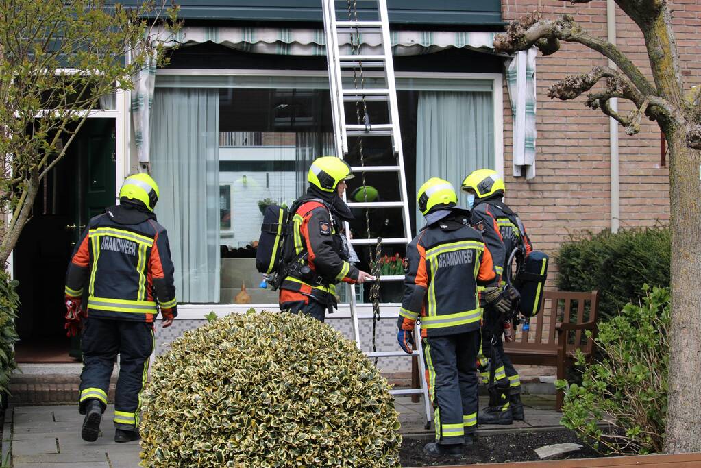 Veel rook bij brand in schoorsteen