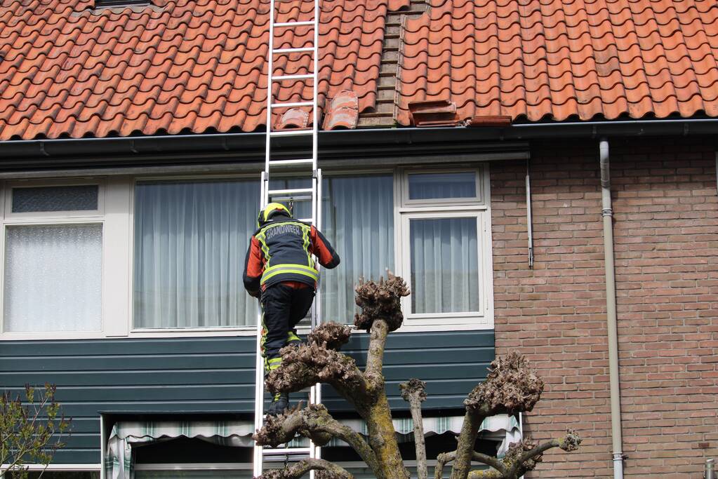 Veel rook bij brand in schoorsteen