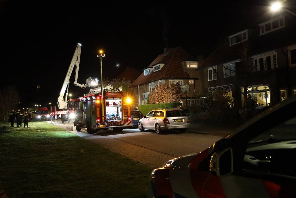 Veel rook door schoorsteenbrand