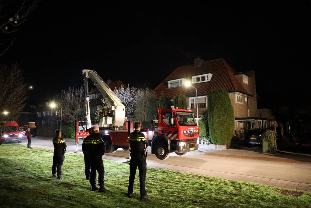 Veel rook door schoorsteenbrand