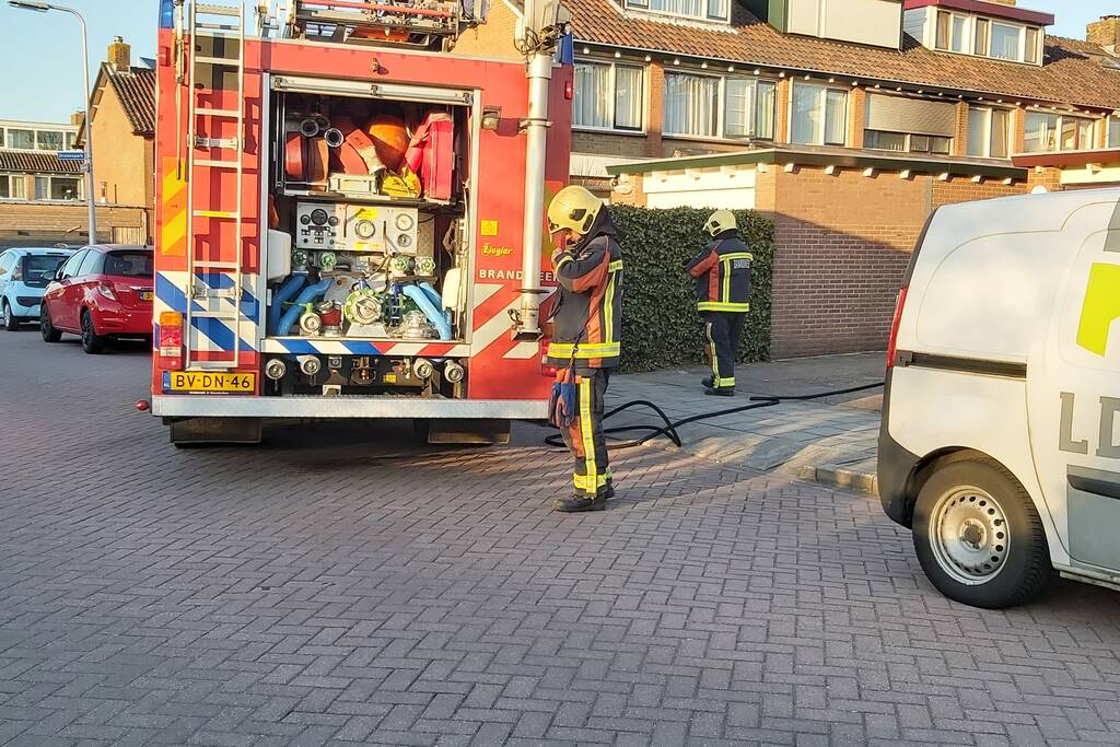 Brandweer blust brandende tuinset