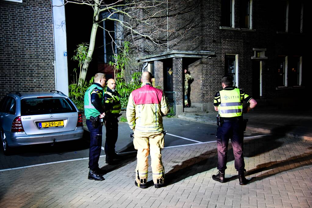 Brand in portiek van woning