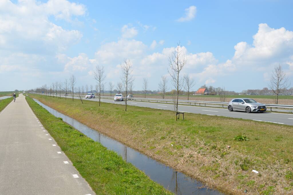 Mini Cooper total-loss na botsing tegen vangrail