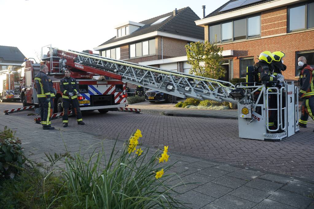 Brand in schoorsteen van woning