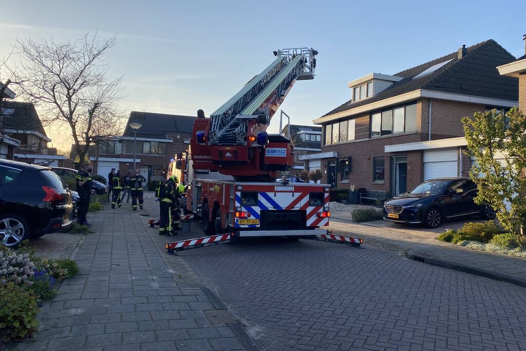 Brand in schoorsteen van woning