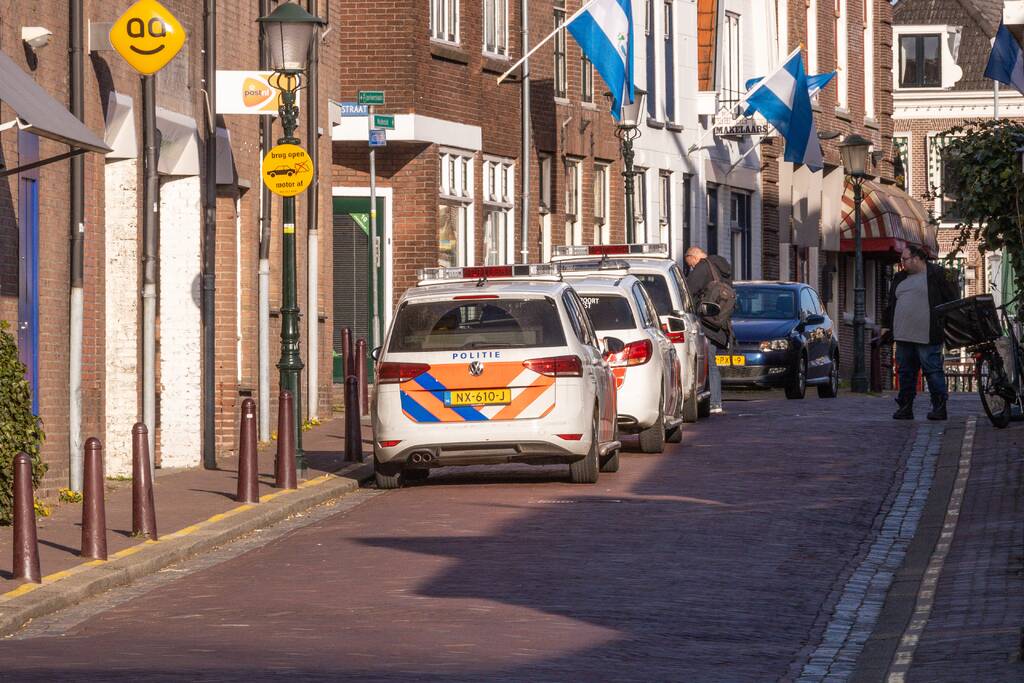 Man met bivakmuts lost schoten