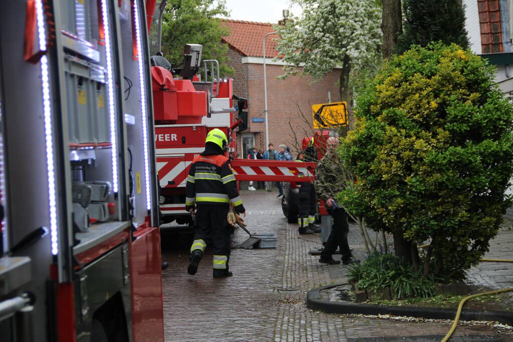 Veel rook bij brand in schoorsteen