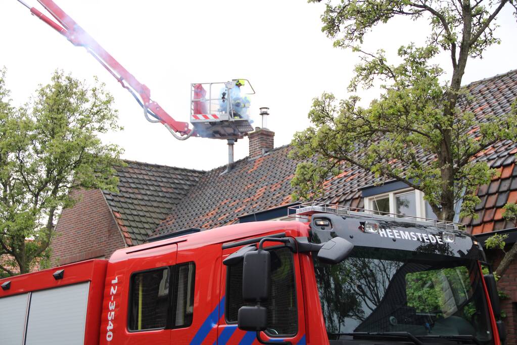 Veel rook bij brand in schoorsteen