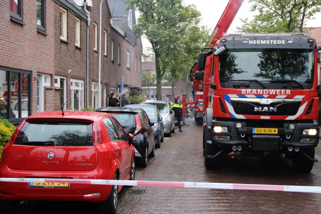 Veel rook bij brand in schoorsteen