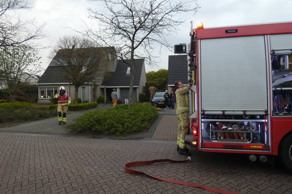 Brand in schoorsteen van woning