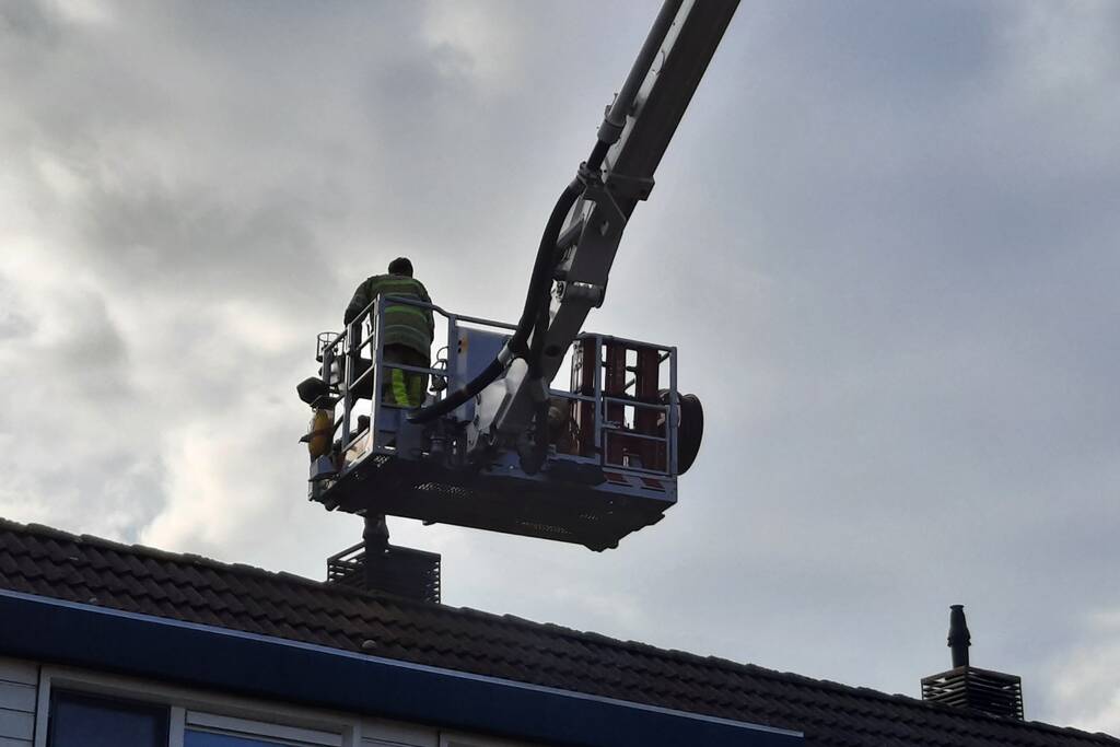 Brand in schoorsteen van woning