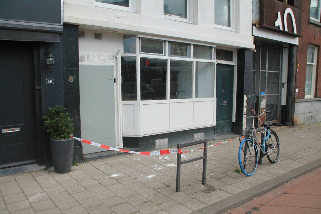 Afzetting door betonbrokken van balkon