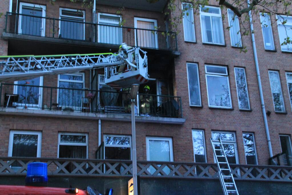 Uitslaande brand in portiekwoning
