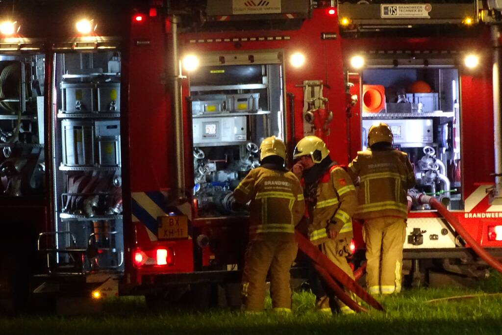 Brand in bos nabij woning