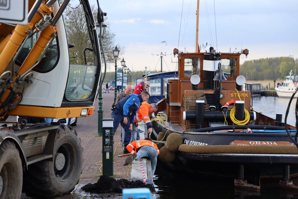 Scooter raakt te water bij ligplaats van watertaxi